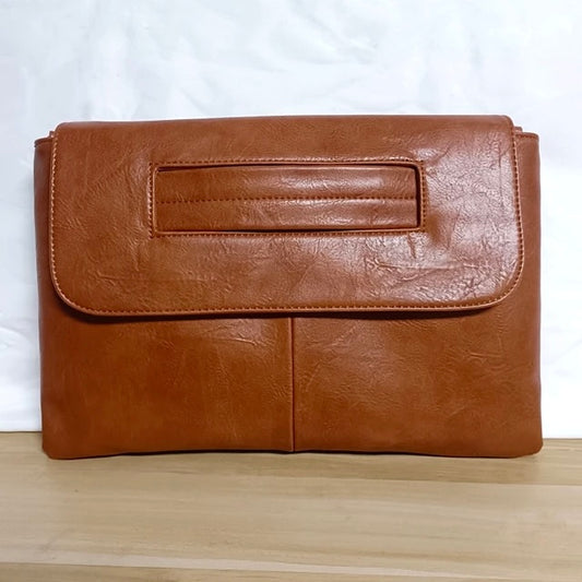 In The Clutch (Brown)